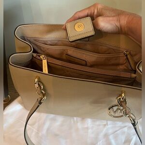Michael Kor’s tan purse. Barely used! $100
